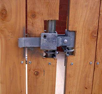 Strong Arm latch on dumpster gate